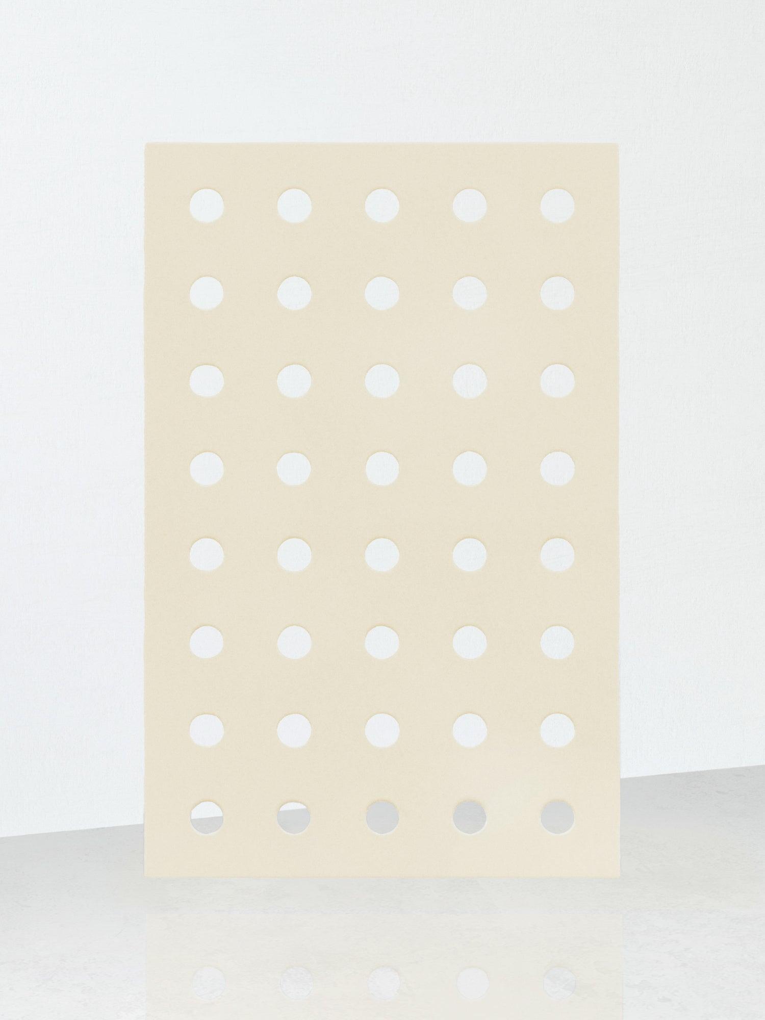 http://biritestudio.com/cdn/shop/products/perforated-rug-large-hole-ivory-bi-rite-studio-1.jpg?v=1667501675