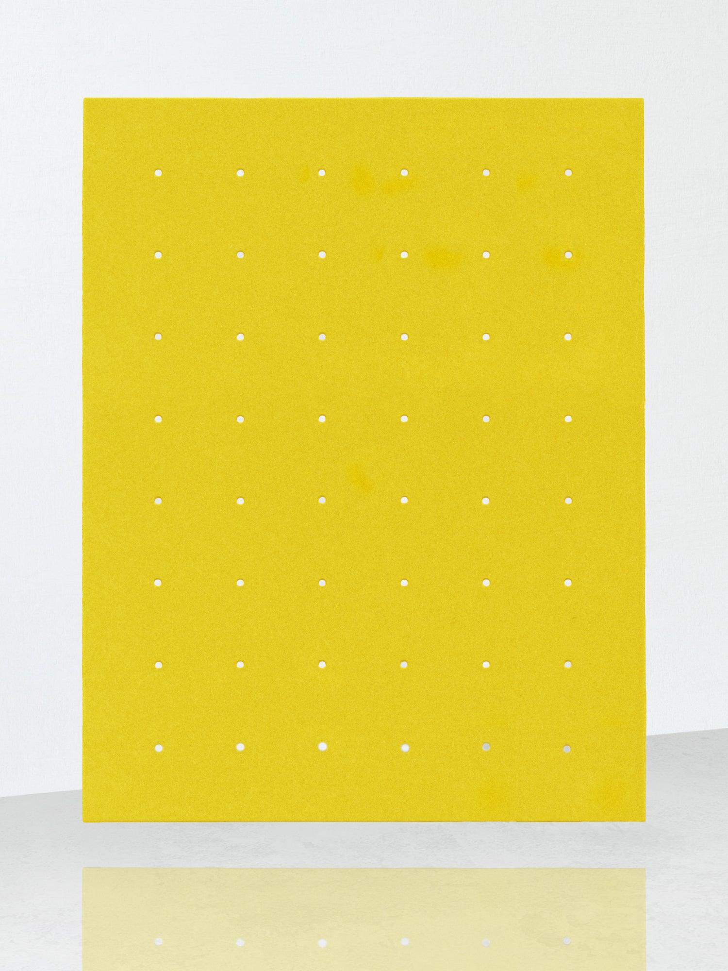 https://biritestudio.com/cdn/shop/products/perforated-rug-small-hole-jasper-yellow-bi-rite-studio-3.jpg?v=1667501730